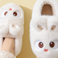 White cartoon bunny plush slippers seen from above on a foot, closed-heel style, option photo for size 32/33