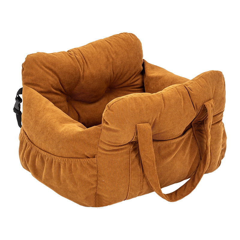 Padded car seat pet bed with raised bolster walls, carry handles and an inner clip in a brown corduroy colourway