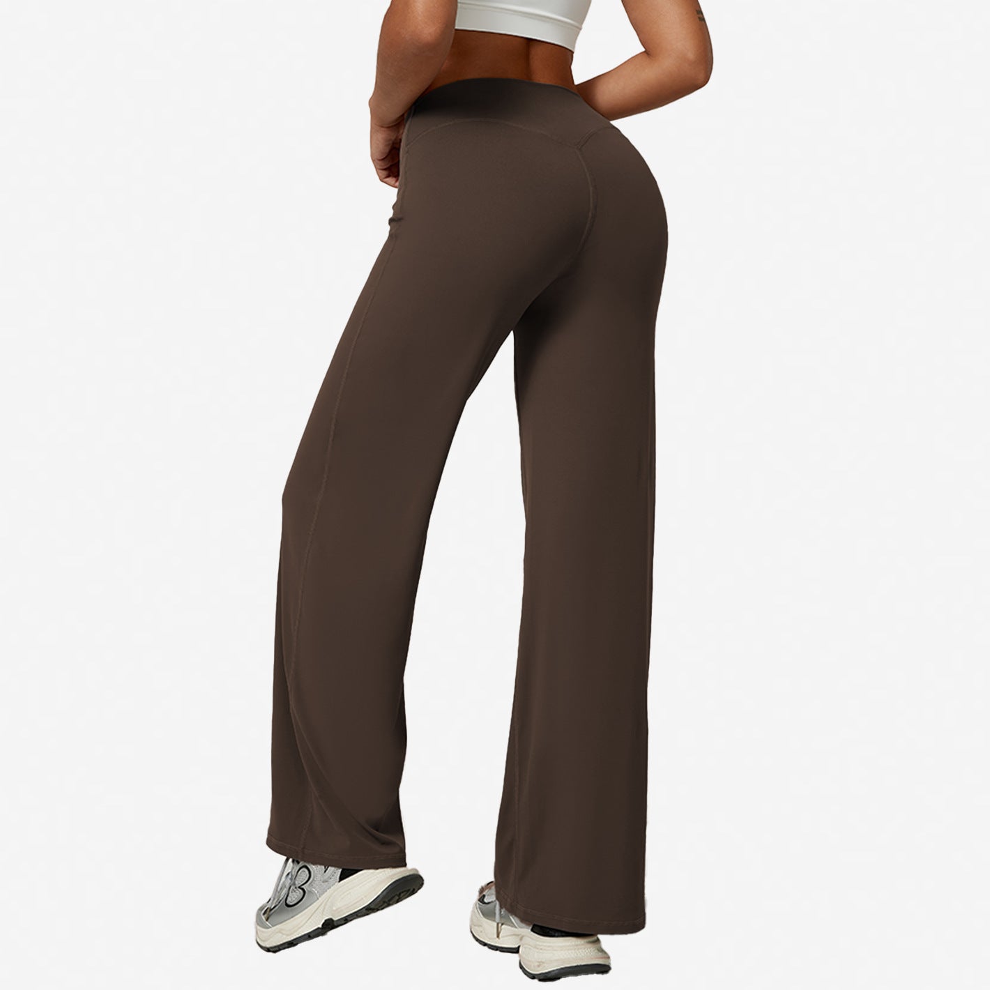 Chestnut brown high-waist wide-leg flared yoga pants side view on a model, white studio