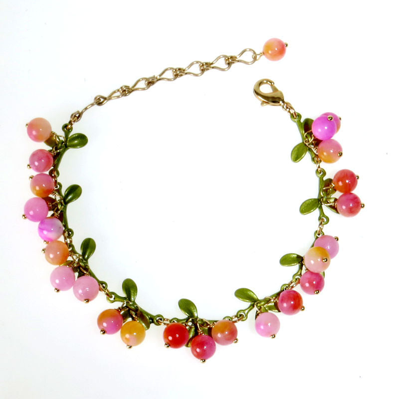 White imitation pearl berry clusters with green enamel leaves on a chain bracelet