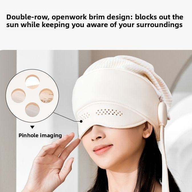 Close up of the cream head and eye massager worn low with its double row vented eye brim