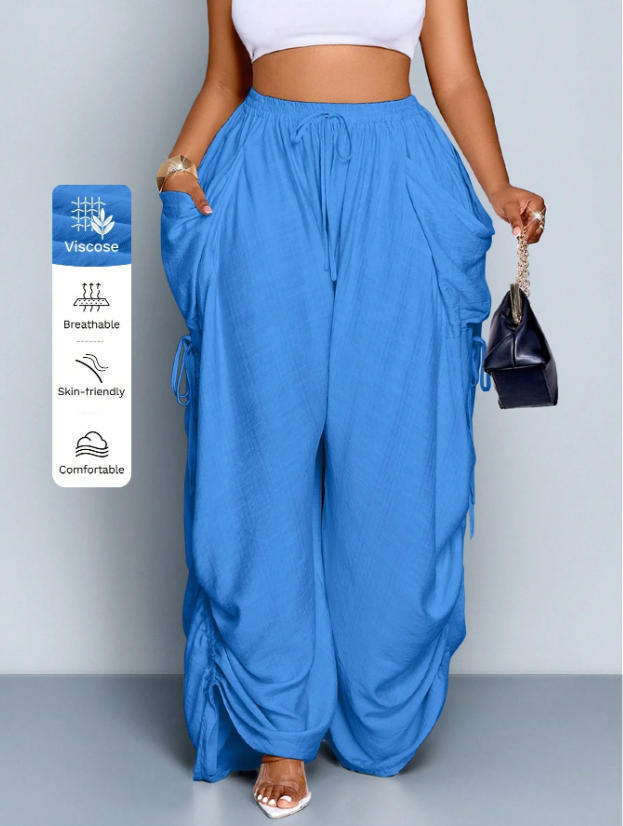 High waist wide leg linen look viscose drawstring trousers, the wide leg falling long to the floor