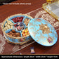 Ornate European resin decor piece with a glossy wood grain finish and antiqued gold tone scrollwork trim