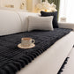 Sweet Serene Black quilted plush sofa cover on a sofa, 90 x 210 cm