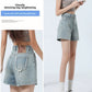 High-waisted blue denim shorts front view with button zip fly and belt loops
