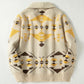 Mens geometric jacquard cardigan worn open over a tee, oatmeal knit with gold and brown motif