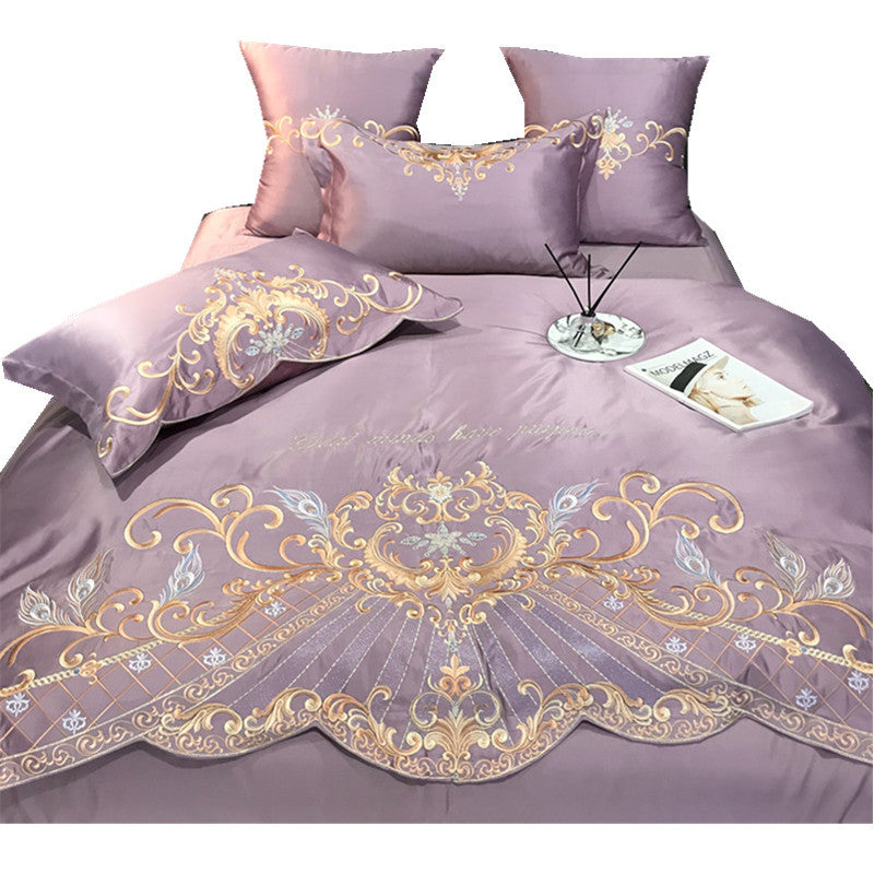 Honeymoon suite bed made up in ivory and rose