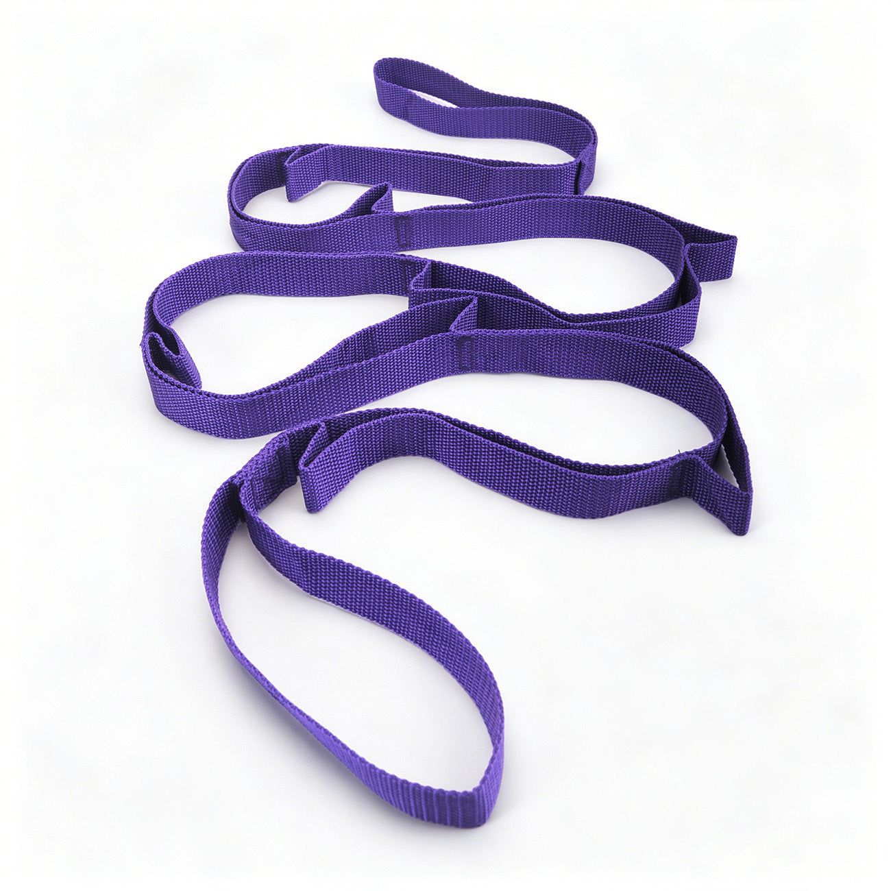 Woven polypropylene stretch strap held taut to show its springy elastic pull