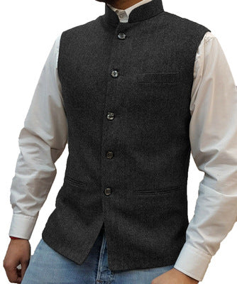 Black herringbone stand collar vest over a white shirt, size XL