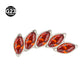 Curved marquise cubic zirconia top of a titanium piercing stud in close view