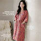 Cotton gauze robe laid flat to show the belt, pockets and full length