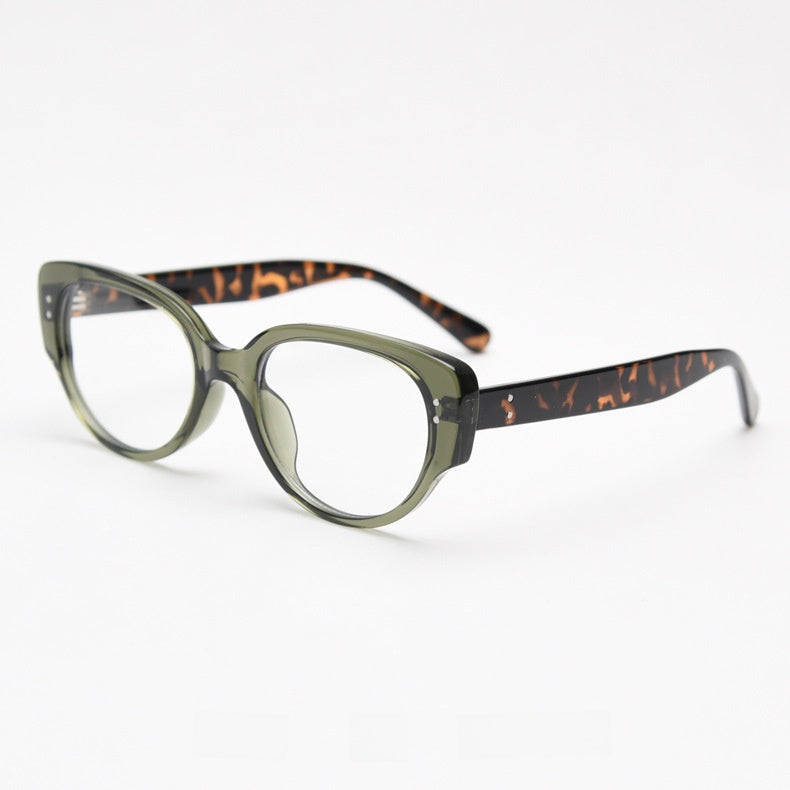 Olive green frame with tortoiseshell patterned temples and clear lenses