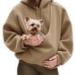 Pink plush fleece hooded sweatshirt with a large front pet pouch shown on a model