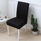 Stretch chair cover fitted over a standard one piece dining chair