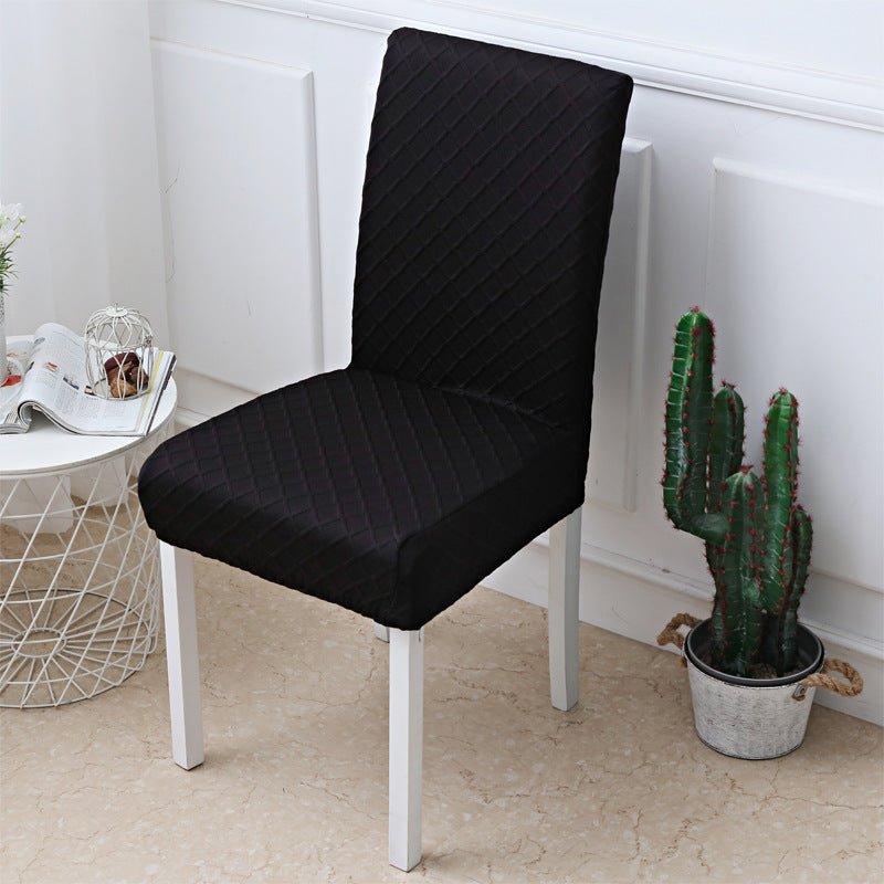 Stretch chair cover fitted over a standard one piece dining chair