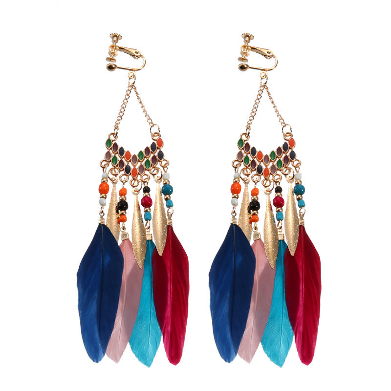 Boho vintage clip-on drop earrings with fringe and bead accents, zinc alloy build, studio image on white background