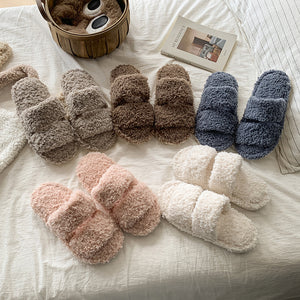 Curly teddy plush open toe house slipper shown as a studio product photo