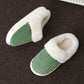 Thick moulded platform sole of the plush lined indoor mule slippers shown from the side
