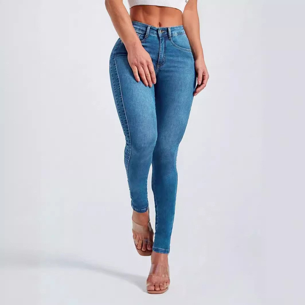 Denim blue high rise skinny jeans front view on a model, size S option