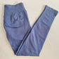 Blue grey seamless yoga leggings folded flat, showing the tall ribbed waistband