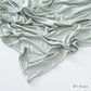 Modal cotton headscarf wrap with a narrow rolled hem running along the finished rectangular edge