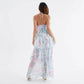 Back view of the floral halter maxi showing the bare tie back