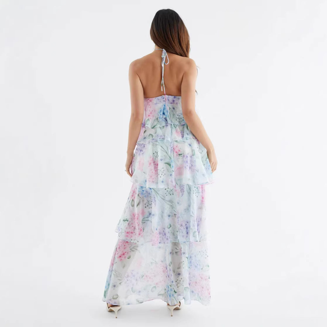 Back view of the floral halter maxi showing the bare tie back