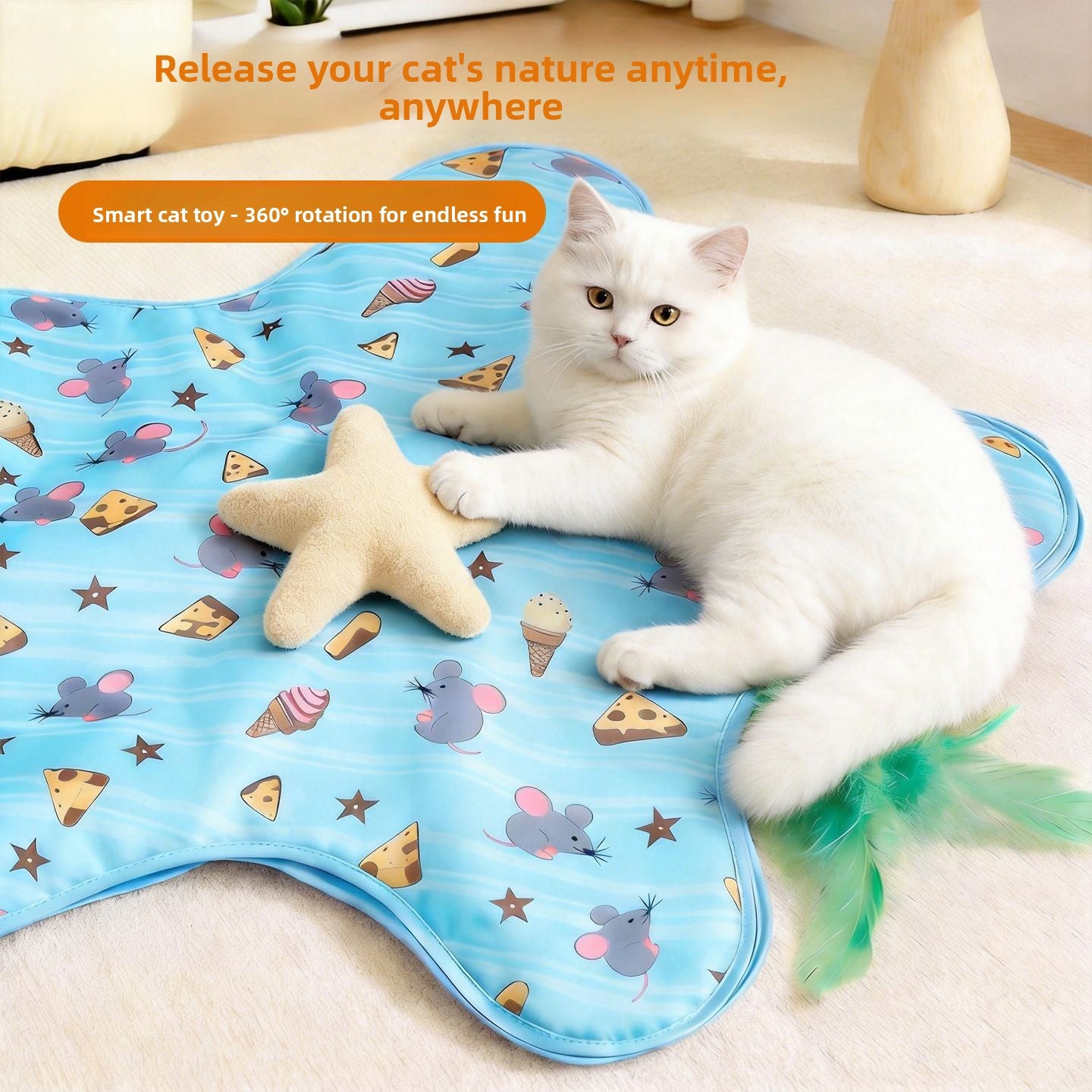 White cat lying on a blue mouse and cheese print star cat teaser mat beside a plain star cushion