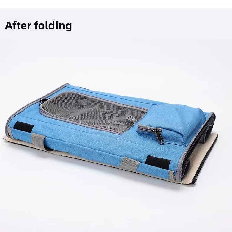 Blue foldable cat carrier shown folded flat with plush mat after folding