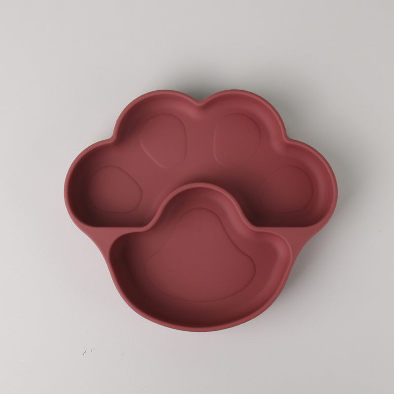 Burgundy bear paw plate alone, with a wide pad and a toe section, on a gray background
