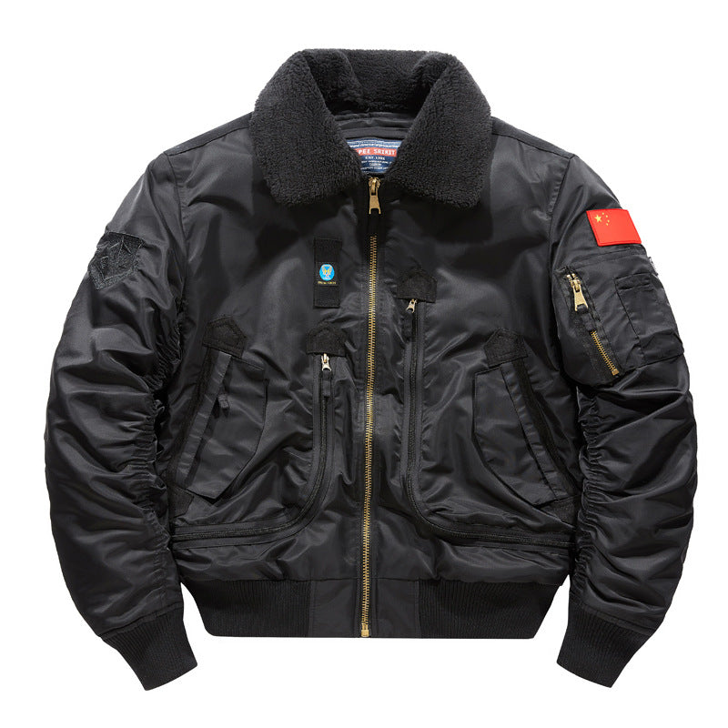Detail of a zip pocket and flap on the chest of the nylon bomber jacket