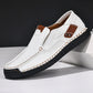 Mens slip on leather loafer in cowhide with visible hand stitching, side view