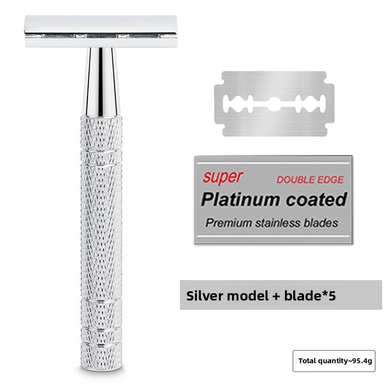 Silver chrome safety razor beside five platinum coated double edge blades