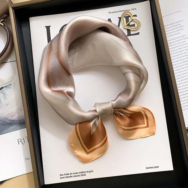Beige minimal print printed square scarf with a satin sheen and hemmed edges, shown displayed and knotted