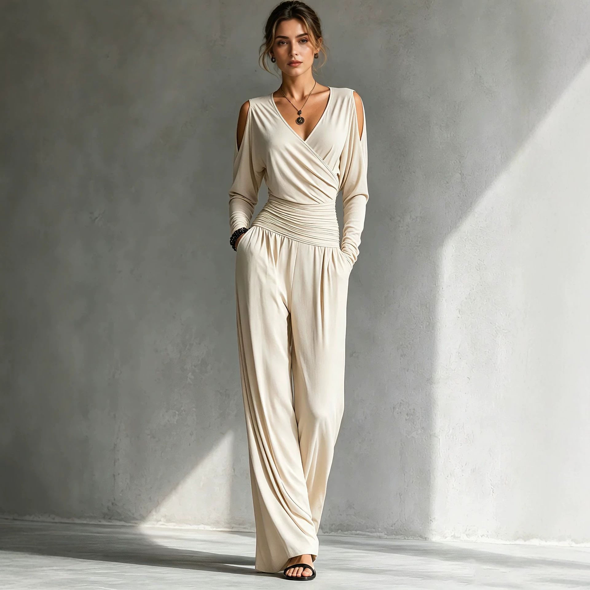 Wrap V-neck front and gathered waist of the milk silk knit jumpsuit