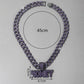 Hip hop money pendant styled on a dark display surface