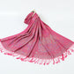 Fuchsia paisley jacquard scarf spread on a white background with twisted fuchsia tassel fringe