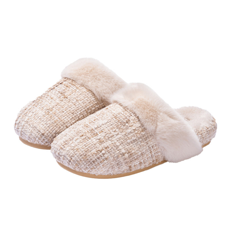 Pair of cream tweed look slippers with a faux fur cuff on a white background