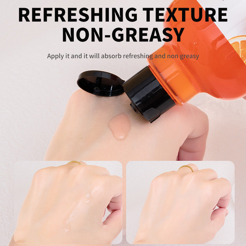 Vitamin C face and body serum bottle showing citrus artwork and a 500ml watery orange solution.