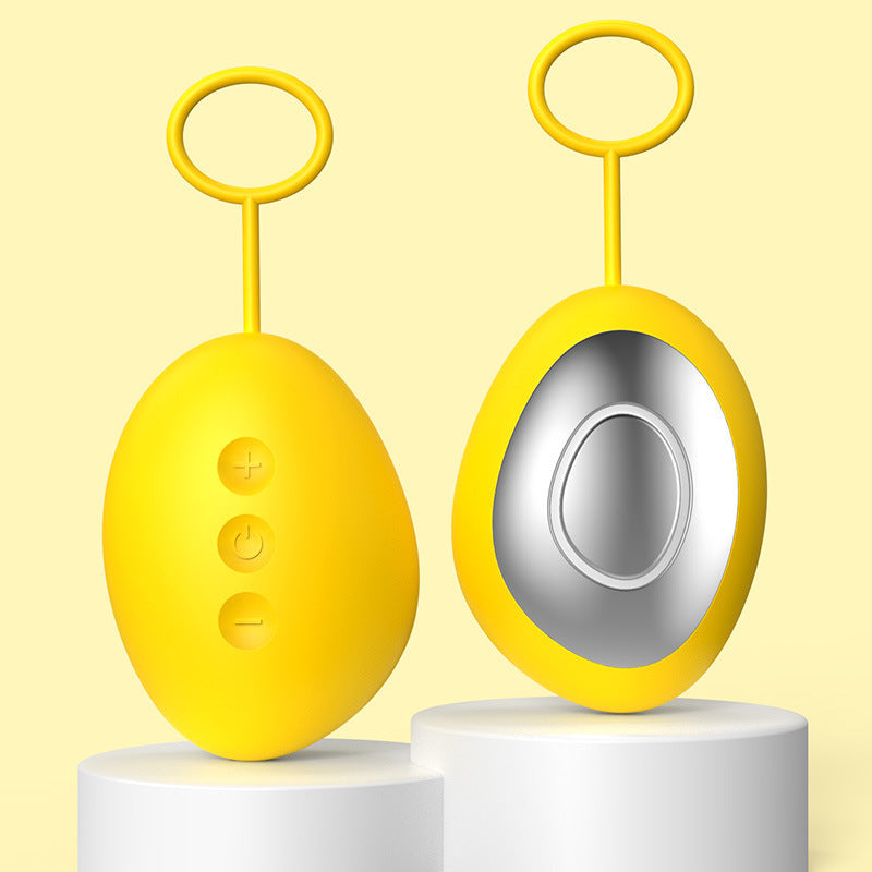 Yellow handheld sleep aid device shown from the button side and the metal plate side