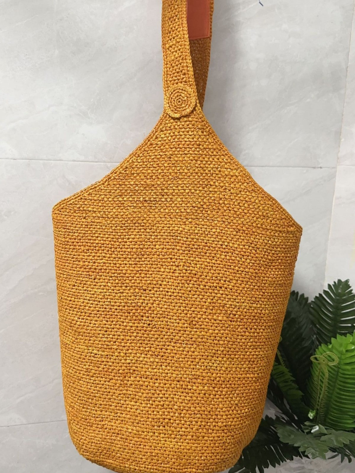 Handmade Women's Summer Shoulder Bag | scale reference with hand