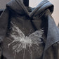 Front close up of the butterfly graphic and drawstring hood