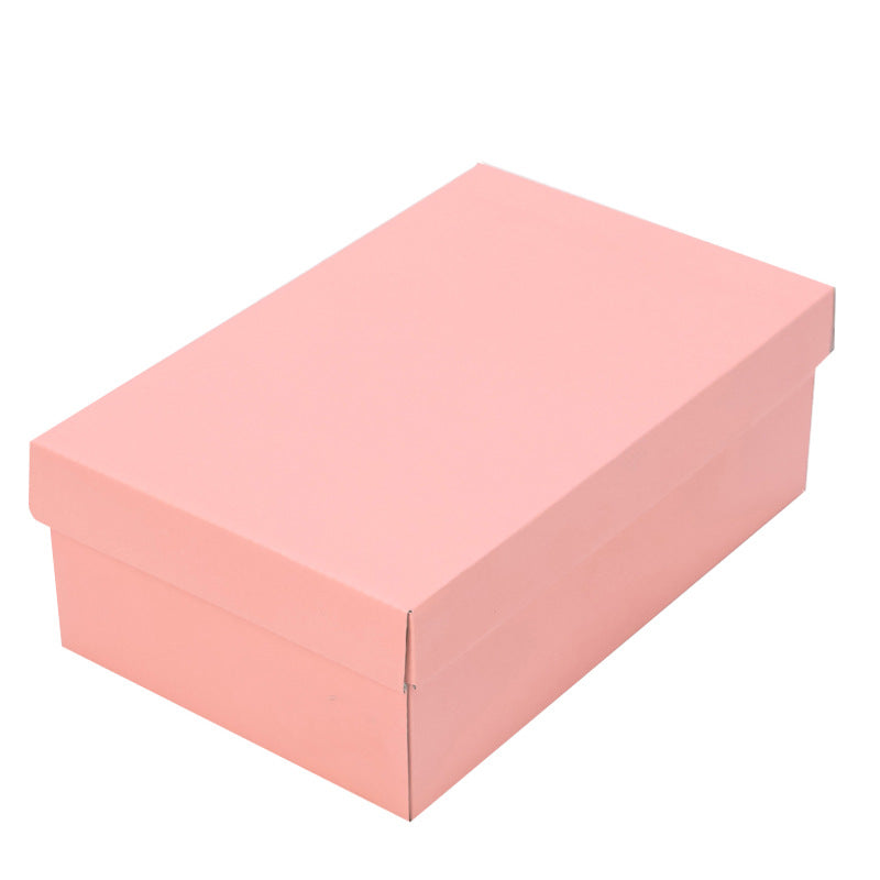 Closed pink cardboard shoe box with a lid on a white background, Pink option