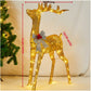 Golden lit reindeer with a silver bow, 100 cm tall, 50 cm long and 18 cm wide on the maker's drawing, 3D variant