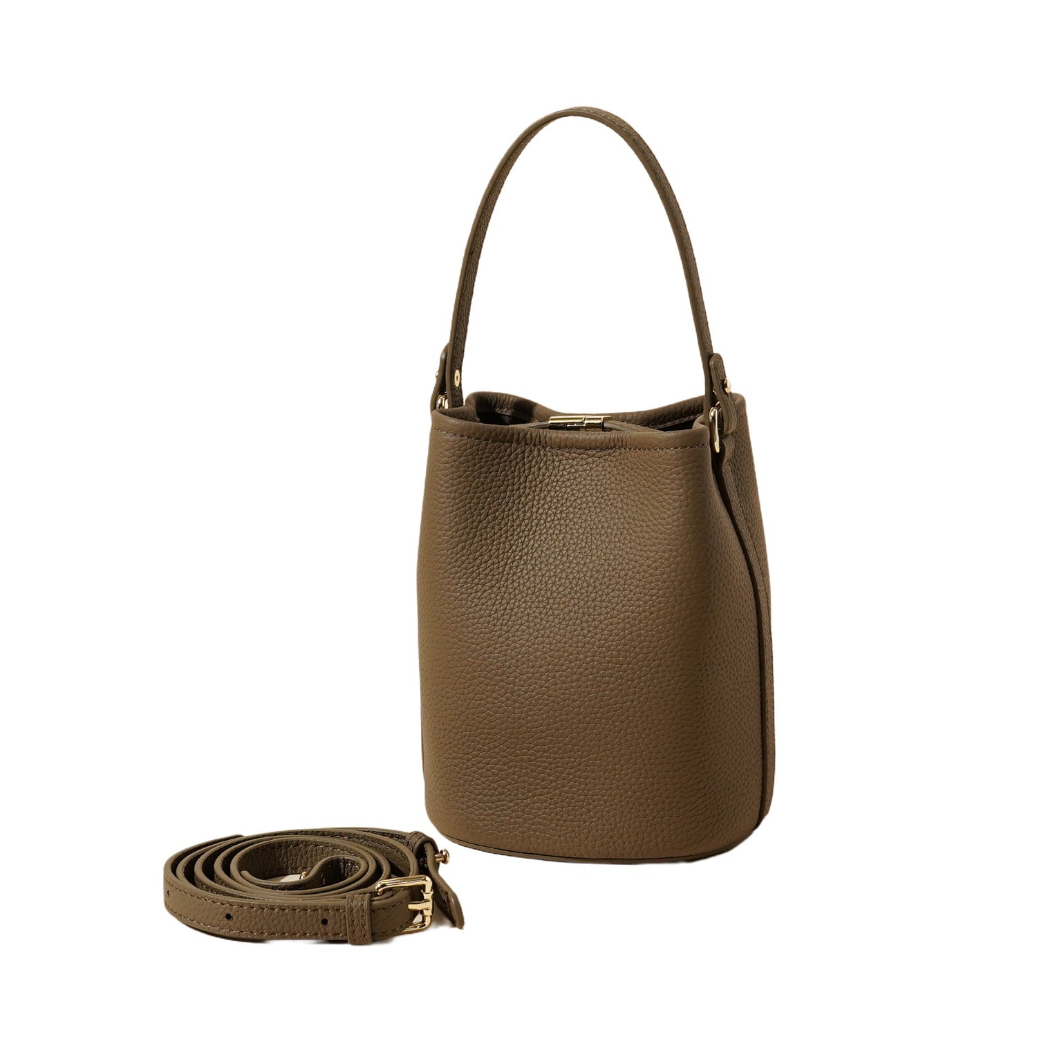 Leather bucket bag carried at the hip on its shoulder strap in daily use