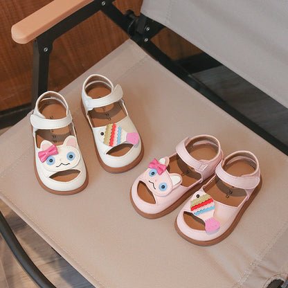 Cartoon baby soft sole sandals in pink, front view of the rounded cartoon toe