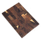 Angled view of the rectangular walnut end grain board on a plain white background