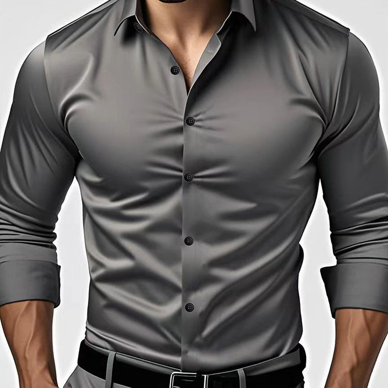 Slim fit button up dress shirt shown on a male model in a solid color with buttoned cuffs