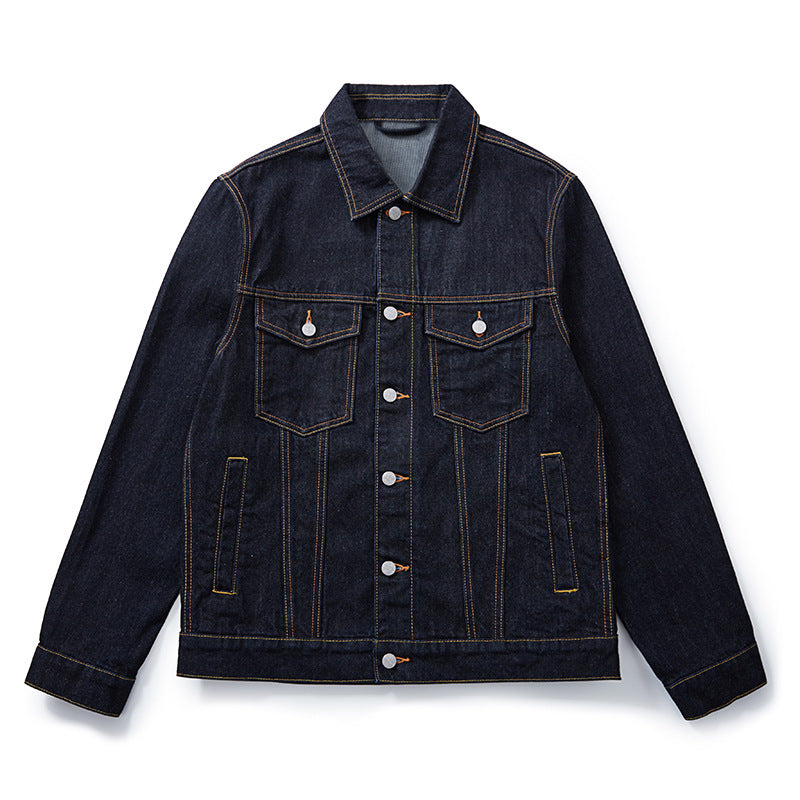Close detail of the collar, cuffs and topstitched denim seams