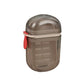 Closed translucent smoke gray soap case with a red silicone tab and beige band on a white background